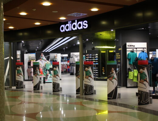 front of an adidas retail store