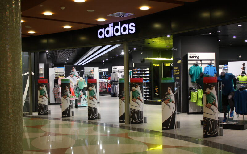 front of an adidas retail store